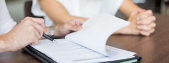 hands-male-executive-showing-contract-female-partner-meeting (1)